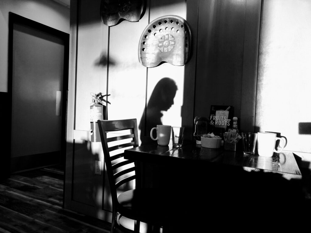 dark room with female silhouette