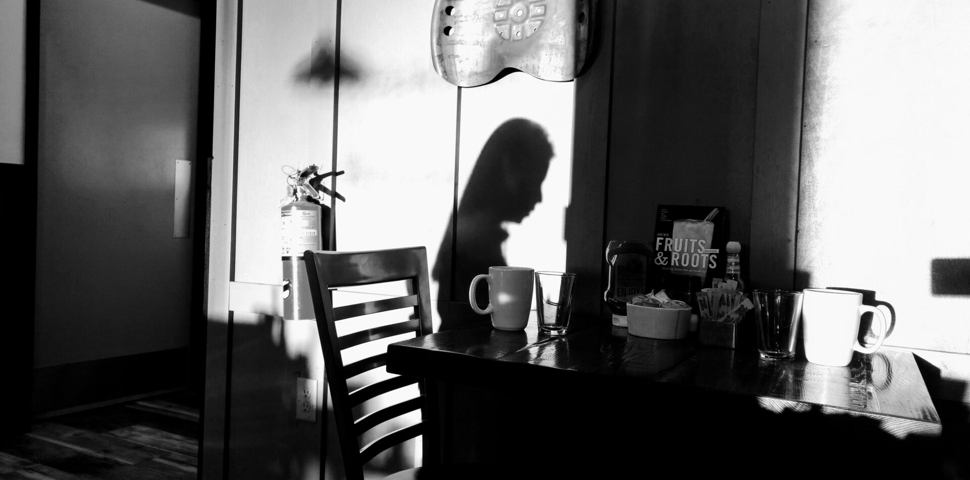 dark room with female silhouette