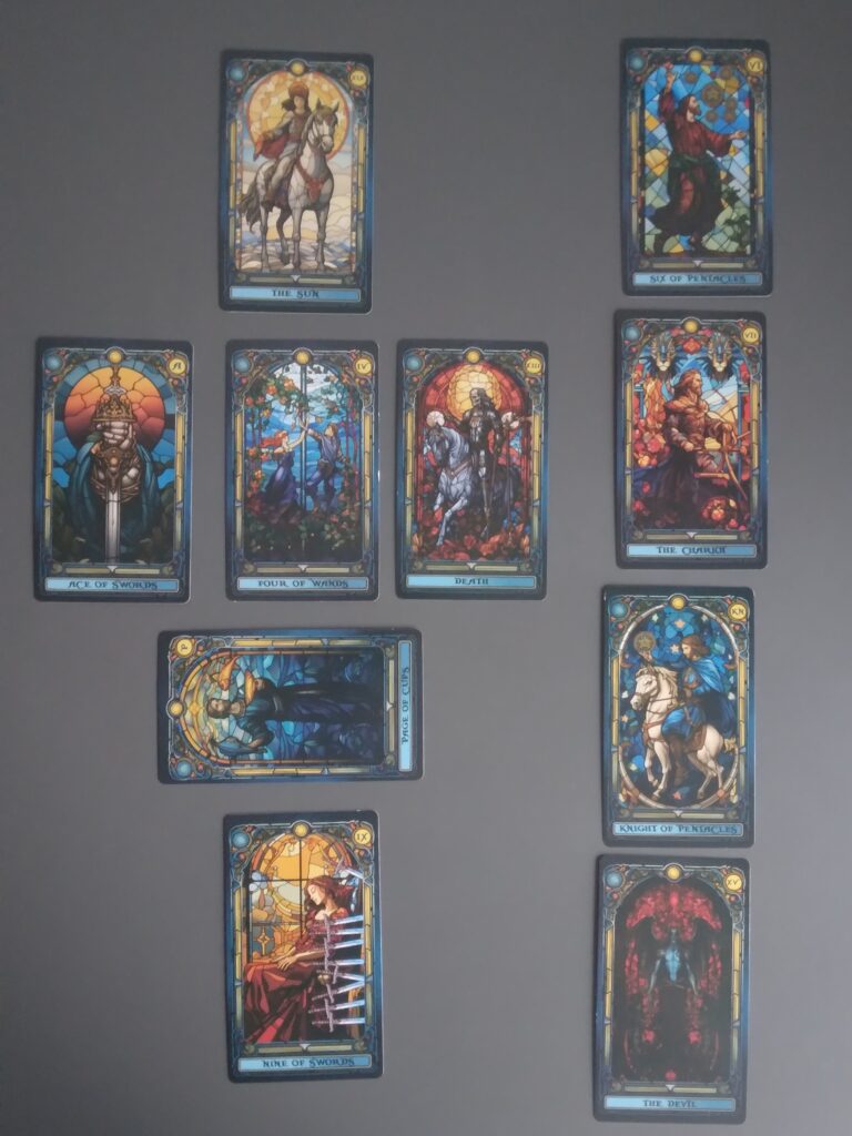 A top-down view of tarot spreads laid out in a structured formation.