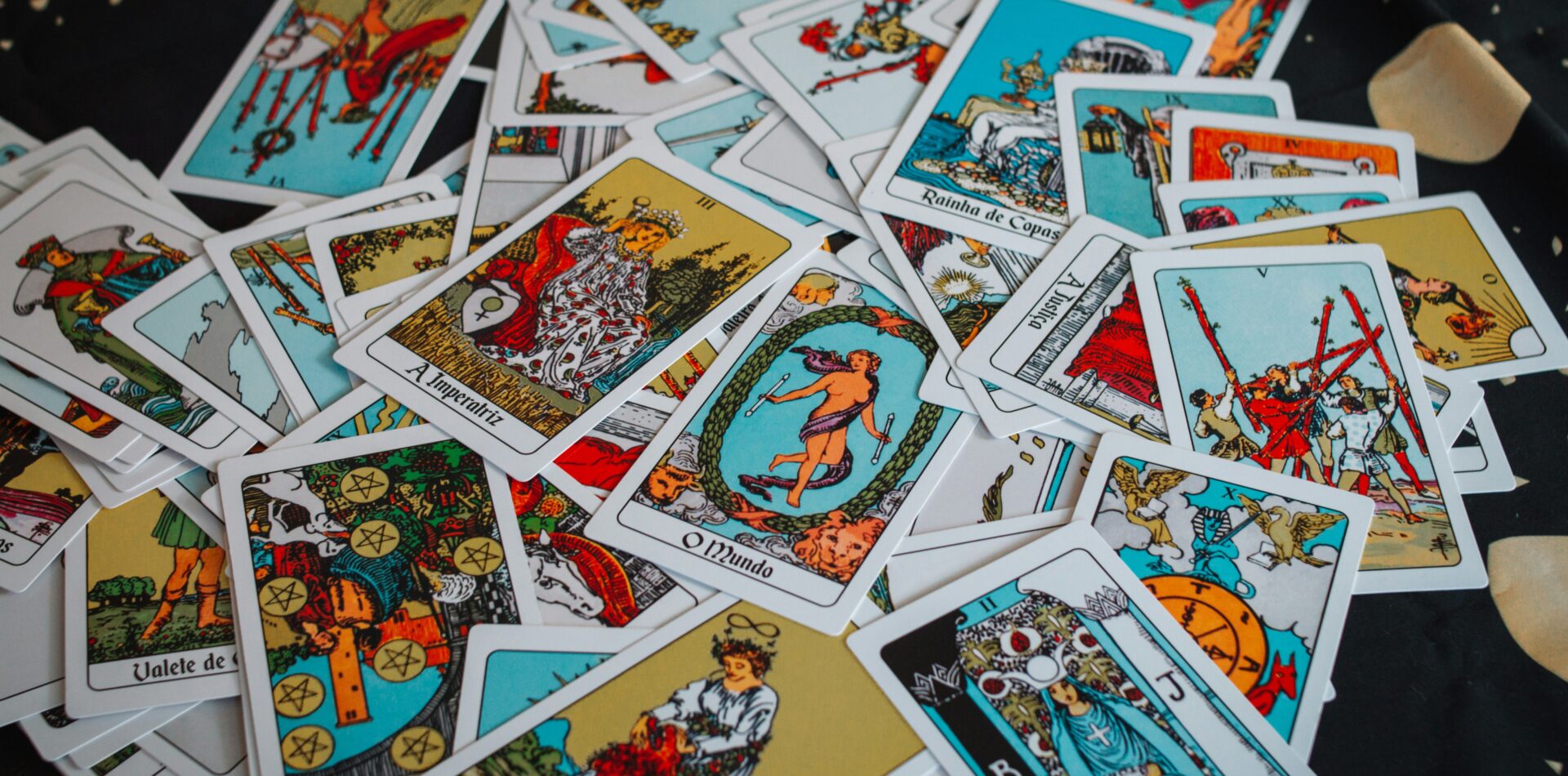 all the tarot cards messed up in a pile on the floor