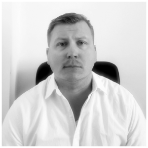 Tarot reader at desk, preparing to conduct an online reading with a client 