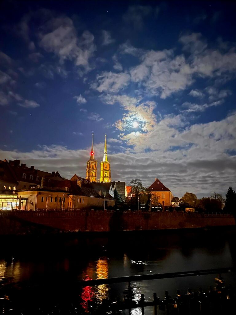 preparation for a full moon spread of Tarot cards near Cathedral Island in Wroclaw